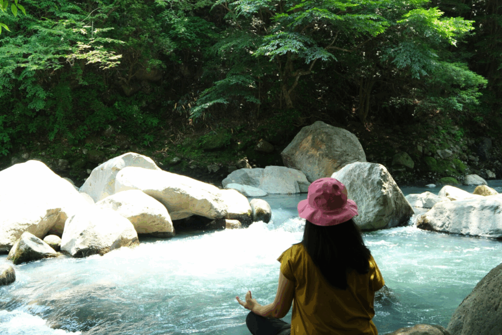 Mindful pause beside the river during the Hakone Valley Walk